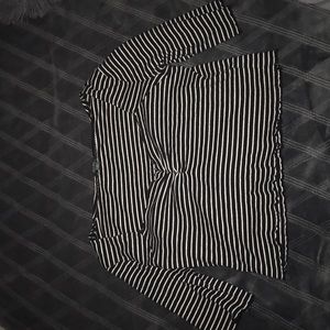 Black and white off the shoulder crop top shirt .